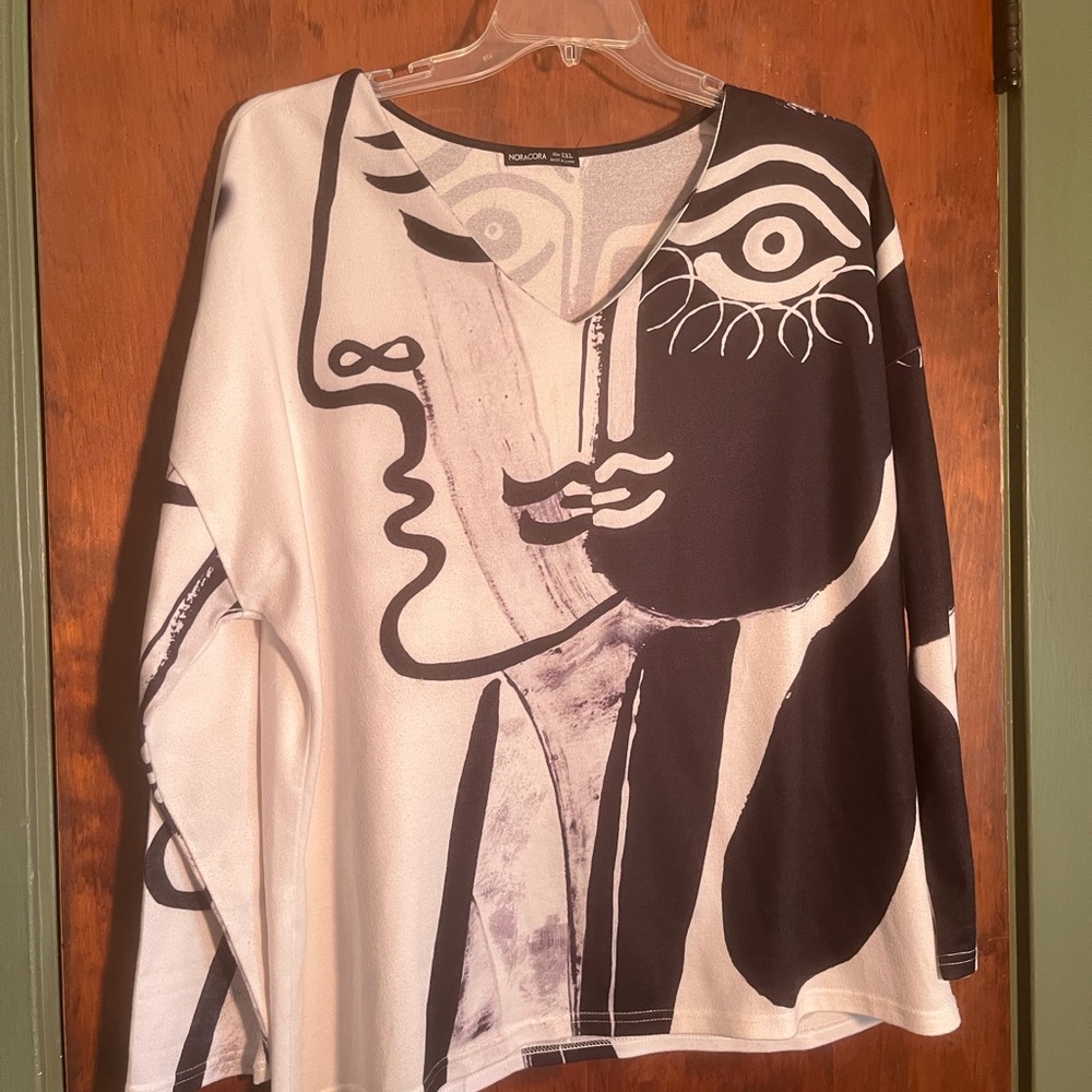 Unbranded Women's Black & White V-Neck Sweater with Abstract Face Print
